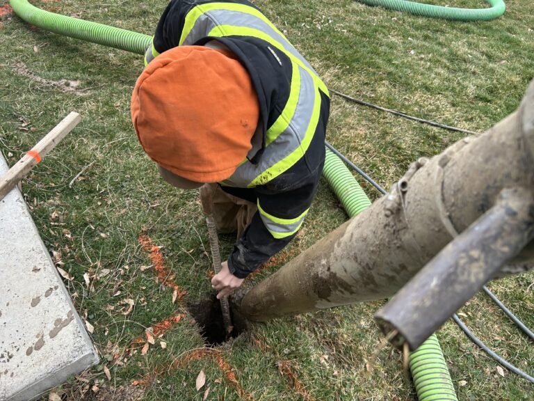 The Grand Maintenance team using a hydrovac to inspect utilities